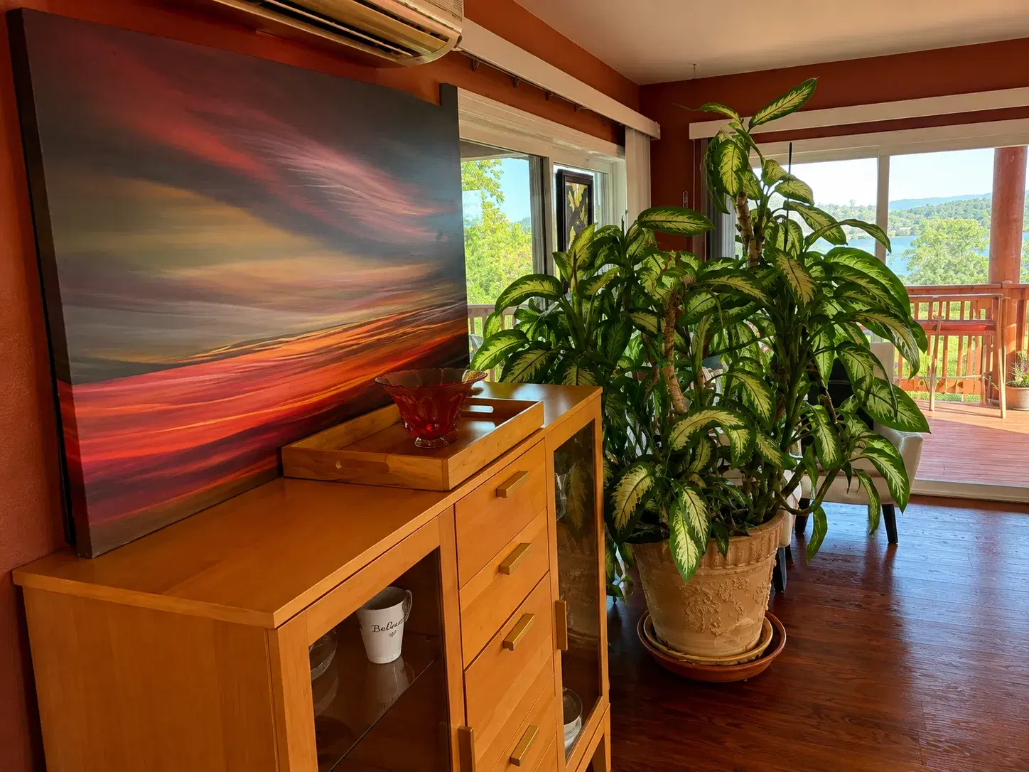 A peaceful home space with plants and artwork